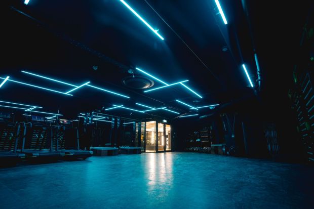 First look: Studio with treadmills, softly lit by neon strips. Photograph: Stephanie Stafford