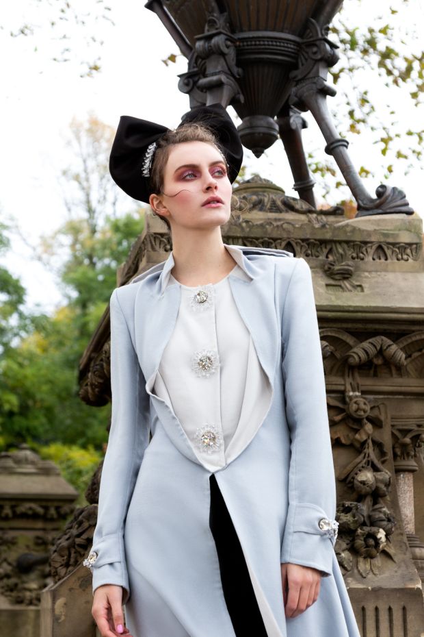 Double faced 100% cashmere coat with handbead embellishment (€3,495), black silk satin trousers (€795), organza bow headband (€385), Swarovski embellished hair slides from €145, all made to order, by Claire O Connor. Photograph: Kristin Brynn Costello