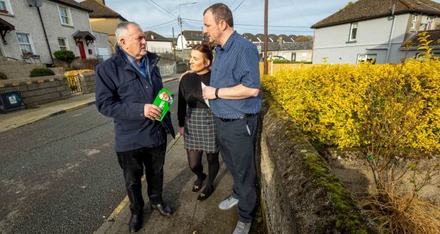 Fianna Fáil TD John McGuinness pictured canvasing on Connolly Street in Kilkenny on Friday with local residents Lisa Marie Meany and Shane Kelly. Photograph: Dylan Vaughan
