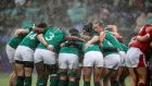 The Ireland team huddle  in the tough weather conditions during the women’s Six Nations match against Wales at  Donnybrook. Photograph: Dan Sheridan/Inpho