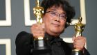 Bong Joon Ho, winner of the Original Screenplay, International Feature Film, Directing, and Best Picture awards for Parasite. Photograph:  Rachel Luna/Getty Images