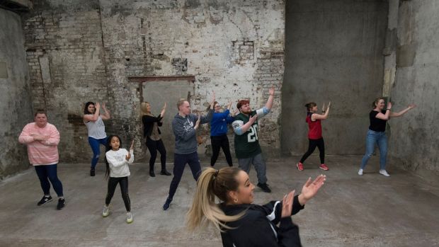 Epic careleavers rehearsing their flash mob moves with dance teacher Rachel. Photograph: Dave Meehan/The Irish Times
