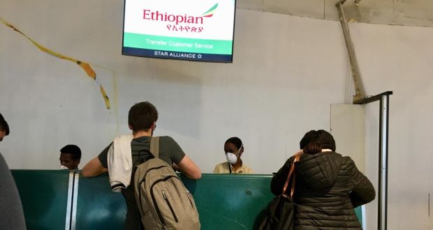 Staff and customers at an Ethiopian Airlines check-in desk at Bole International Airport in Addis Ababa. Photograph: Sally Hayden