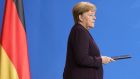 Merkel condemns ‘poison’ of racism after gunman kills nine in Germany
