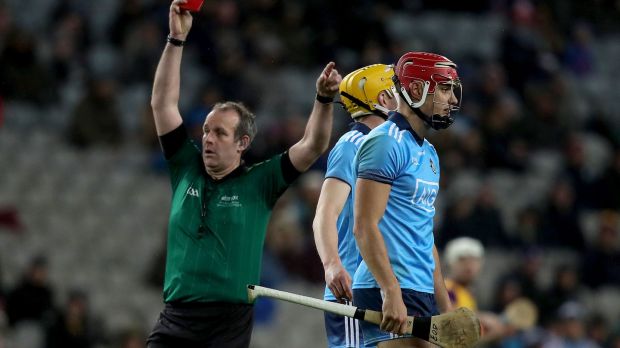 Dublin’s Eoghan O’Donnell is shown a red card during his side’s late defeat to Wexford. Photograph: Bryan Keane/Inpho
