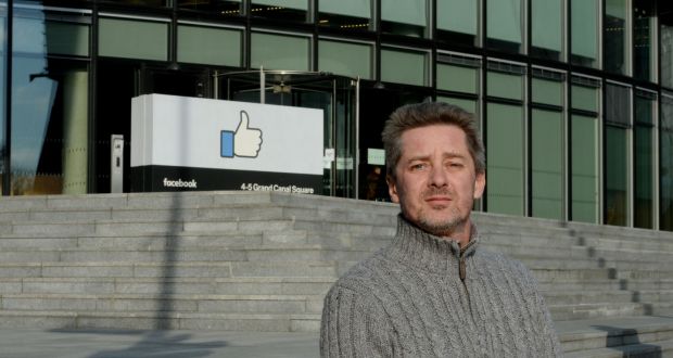 Chris Gray, a former Facebook content moderator, outside the company’s office at Grand Canal Dock. Photograph: Alan Betson