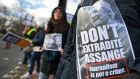 Julian Assange supporters protest outside Woolwich Crown Court in London on Wednesday. Photograph: Andy Rain/EPA