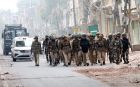  Indian security forces patrol on Wednesday near the site of violent clashes  in eastern Delhi. Photograph: Harish Tyagi/EPA
