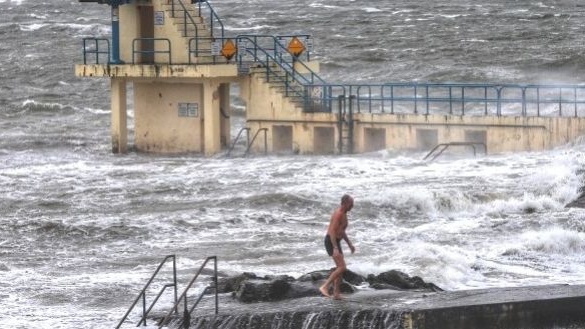 A swimmer at Blackrock in Galway braves the elements as Storm Jorge hits Ireland. Photograph: Damien Storan