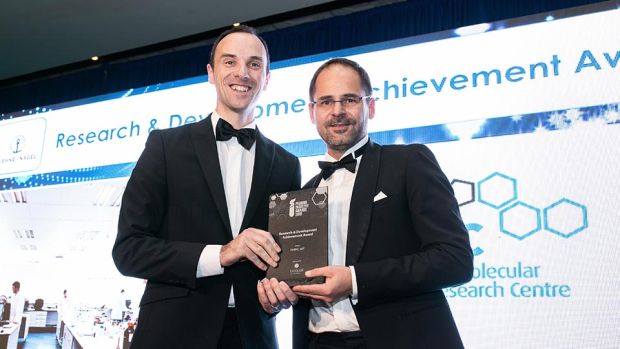Nihad Hasagic, VP, Bioquell Business and Integration Leader presents the Research & Development Achievement Award to Niall O'Reilly, PMBRC, WIT.