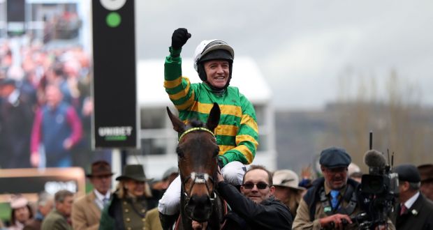 Barry Geraghty aboard Epatante celebrate their victory in the Champion Hurdle at Cheltenham Festival at Cheltenham. Photograph: Simon Cooper/PA Wire. 