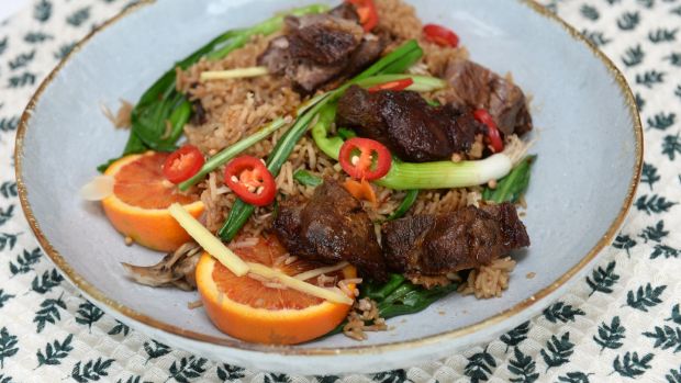 Duck leg with wild garlic spiced rice: wild garlic leaves and spring onions give the dish a fresh, vibrant colour. Photograph: Dara Mac Dónaill