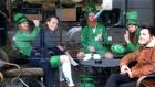  Visitors to Dublin sit in a coffee shop on St Stephens Green on the eve of St Patrick’s Day ahead of what will be a very scaled back national holiday due to the coronavirus. Photograph: Dara Mac Dónaill/The Irish Times.