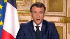 French president Emmanuel Macron gives a TV address to the nation announcing sweeping new measures to stem the spread of the new Covid-19 virus. Photograph: France Televisions via AP