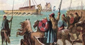 Engraving of an ancient British warrior waiting on the beach to meet the Roman invasion forces. Illustration: Getty