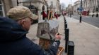  A painter paints a scene of Horse Guards Parade in central London. Photograph: Will Oliver/EPA