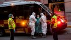 A patient is transferred to a medicalised hotel during the COVID-19 outbreak in Madrid, Spain. File photograph: Bernat Armangue/AP.