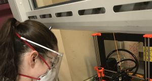 I-Form researcher Heather O’Connor printing one of the centre’s face masks.