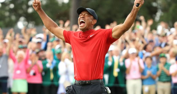 Tiger Woods celebrates after sinking his putt to win the 2019 Masters at Augusta National Golf Club. Photograph: Andrew Redington/Getty Images