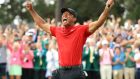  Tiger Woods celebrates after sinking his putt to win the 2019 Masters at Augusta National Golf Club. Photograph: Andrew Redington/Getty Images