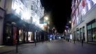 A deserted Grafton Street on the first Friday night of lockdown. Photograph: Bryan O’Brien/The Irish Times.