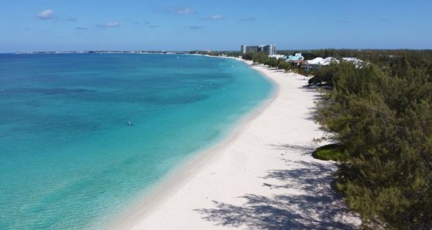 An unusual sight: No people on  Seven Mile Beach in Grand Cayman  during coronavirus restrictions.