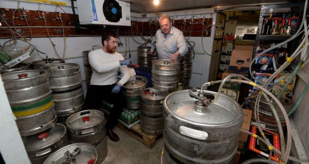Summit Inn  owners Thomas and Tommy Gaffney:  beer kegs will go out of date before Covid-19 restrictions are lifted. Photograph: Alan Betson