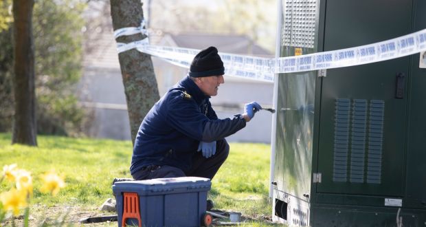 Garda forensics officer at the scene in Letterkenny where it is suspected that a telecommunications mast near the town’s hospital was deliberately set on fire. Photograph: North West Newspix.