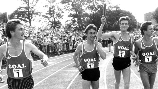 Frank O’Mara, Marcus O’Sullivan, Ray Flynn and Eamonn Coghlan take a lap of honour after setting a world record in the 4 x 1-mile relay at Belfield in August 1985. Photograph: Dermot O’Shea