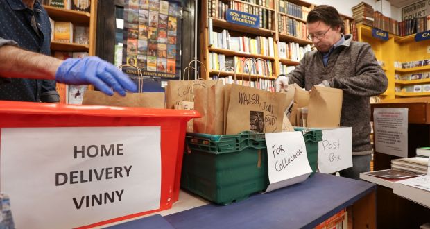 Vinny Byrne packing books for delivery at Charlie Byrne’s Bookshop in The Cornstore at Middle Street in Galway city. Photograph: Joe O’Shaughnessy
