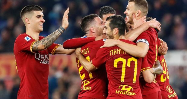  Roma’s Edin Dzeko (right) celebrates with team-mates after scoring his side’s third goal in the Serie A  match against  US Lecce at the Stadio Olimpico in February. Photograph: Riccardo Antimiani/EPA