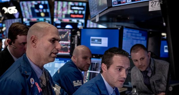  Traders at the New York Stock Exchange: Wall Street jumped 1 per cent on Thursday. Photograph: Ashley Gilbertson/ The New York Times