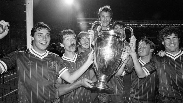 Robinson (left) celebrates winning the 1984 European Cup with Liverpool with Graeme Souness, David Hodgson, Phil Neal, Mark Lawrenson, Sammy Lee and Craig Johnston. Photo: Monte Fresco/Mirrorpix/Getty Images