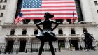 The ‘Fearless Girl’ statue outside the New York Stock Exchange: Wall Street equities rose on Wednesday. Photograph: Johannes Eisele / AFP.