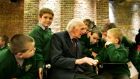 John Gallagher talks with students from Francis Street  school in 2007. He was chairman of the board of management there for years. File photograph: Kate Geraghty. 
