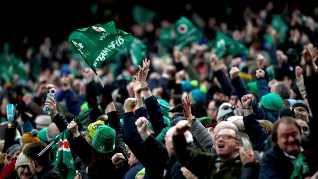 Ireland fans celebrate against Wales in this year’s Six Nations. ‘Being closely packed together and feeling the ups and downs of a match through the people around you is what being a fan in a stadium is about. It is a key part of the experience.’ Photograph: Bryan Keane/Inpho