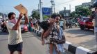 A man carries a fainted young girl (R) to evacuate her following a gas leak incident at an LG Polymers plant in Visakhapatnam on Thursday. Photograph: STR/AFP via Getty Images