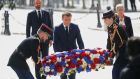 French President Emmanuel Macron lays a wreath of flowers for VE day at the Arc de Triomphe in Paris. Photograph: Charles Platiau/AFP via Getty Images 