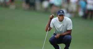 Tiger Woods was chewing gum the whole way through his victory at last year’s US Masters. Photo: David Cannon/Getty Images