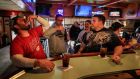 Whale of a time: Customers drink at the Somewhere bar in Fond du Lac, Wisconsin, earlier this month, after the state’s supreme court struck down governor Tony Evers’s stay-at-home order. Photograph: Tannen Maury/EPA