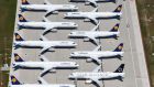  Lufthansa aircraft   at Berlin Brandenburg International Airport in Schönefeld, Germany. The German government and Lufthansa have reached an agreement on a bailout rescue package. Photograph: EPA/Oliver Lang