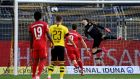 Borussia Dortmund  goalkeeper Roman Buerki can’t keep out Joshua Kimmich’s first half opener. Photograph: Federico Gambarini/PA
