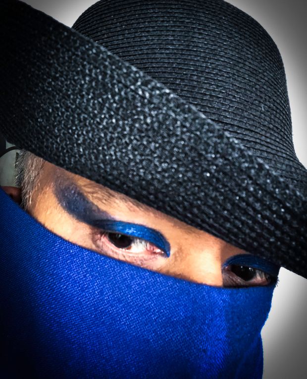 Nick Barose’s blue eyeliner, with face covering