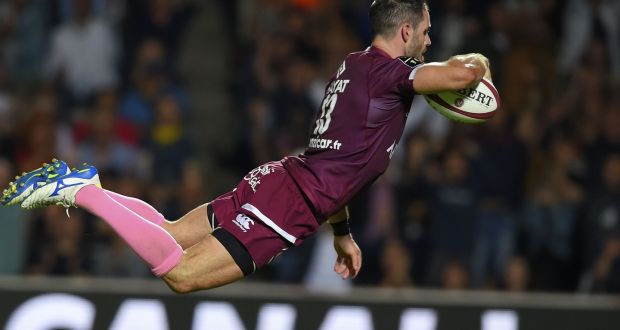  Bordeaux-Begles’  Jean-Baptiste Dubie dives in to score  a try during the  Top 14  match against Clermont Auvergne at the Chaban-Delmas stadium in Bordeaux. Photograph:   Nicolas Tucat/AFP via Getty Images