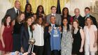 US president Barack Obama holds a jersey while posing for a picture during an event to honour the Minnesota Lynx team for its 2015 WNBA championship victory, in the East Room at the White House in June , 2016. Photograph: Mark Wilson/Getty Images