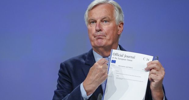Michel Barnier holds the Official Journal of the European Union C34 during a press conference on Friday in Brussels regarding the fourth round of Brexit negotiations. Photograph:  Daina Le Lardic/ Pool/Getty Images