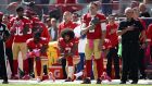 Eric Reid and Colin Kaepernick, then of the San Francisco 49ers, kneel during the national anthem in October 2016. Photograph: Ezra Shaw/Getty