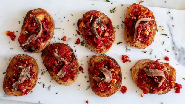 Crostini with sun-dried tomato and anchovy.