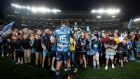 Beauden Barrett of the Blues signs autographs after a match against the Hurricanes at Eden Park in Auckland, New Zealand. Photograph: Hannah Peters/Getty