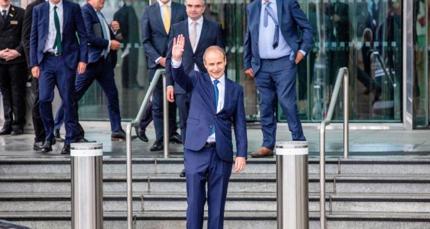 Fianna Fail leader and incoming Irish prime minister Micheal Martin leaves the Convention Centre in Dublin after a special sitting of the Dail parliament. Photograph: Getty Images